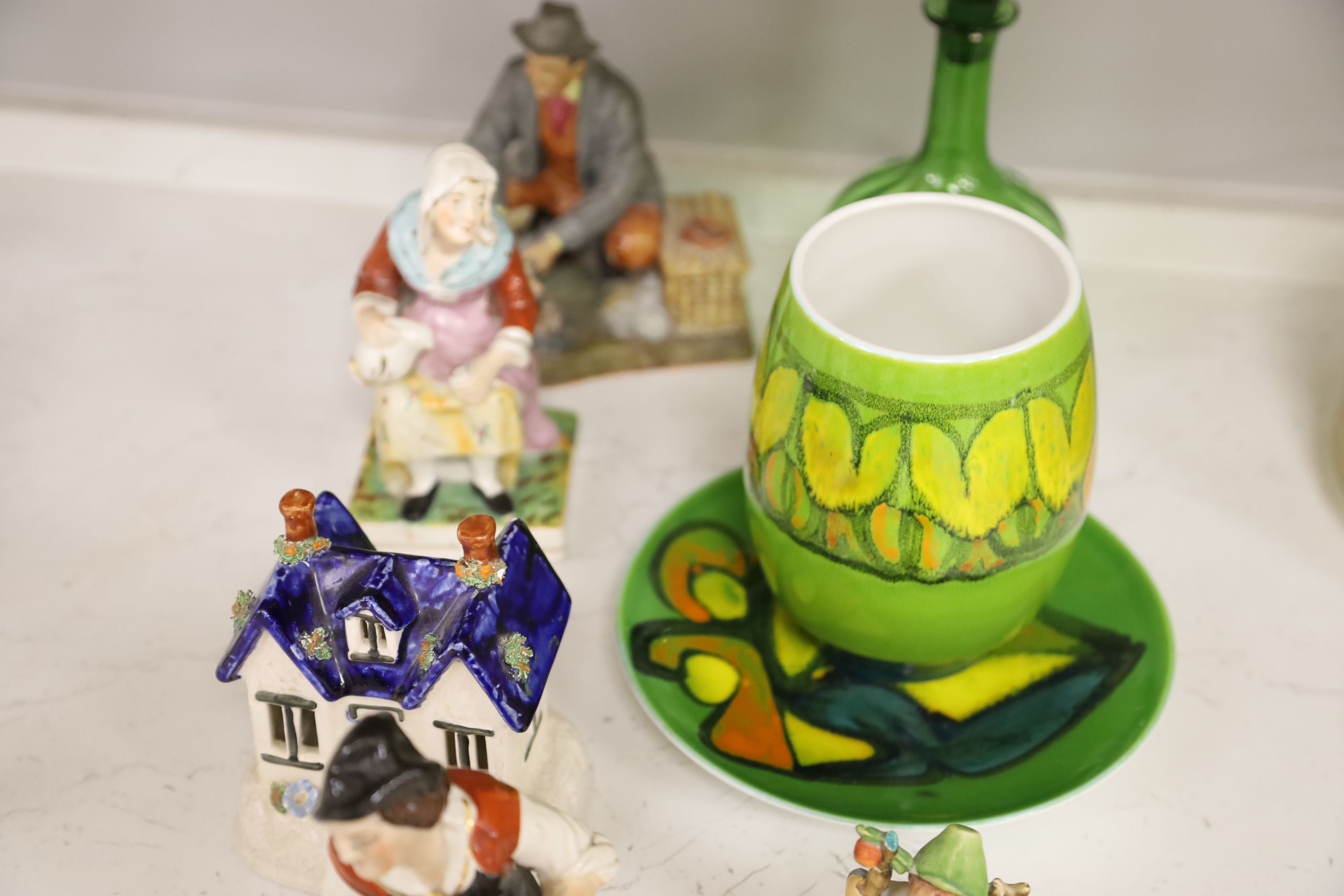 A quantity of mixed ceramics including Poole, Staffordshire, Goebel and a green glass decanter